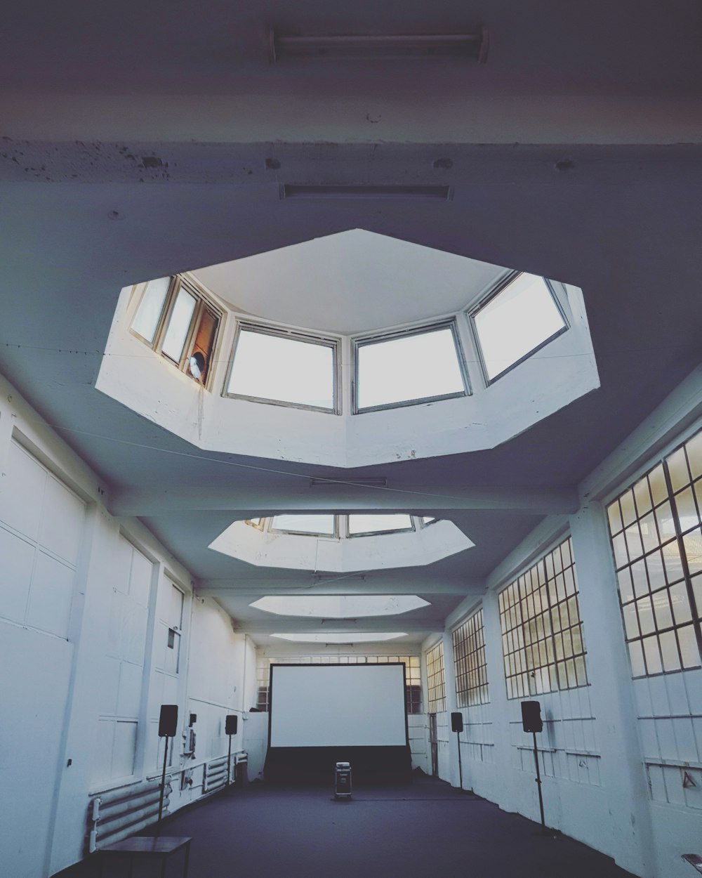 low-angle photography of white concrete building