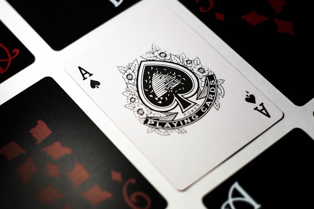 spade playing card on white surface