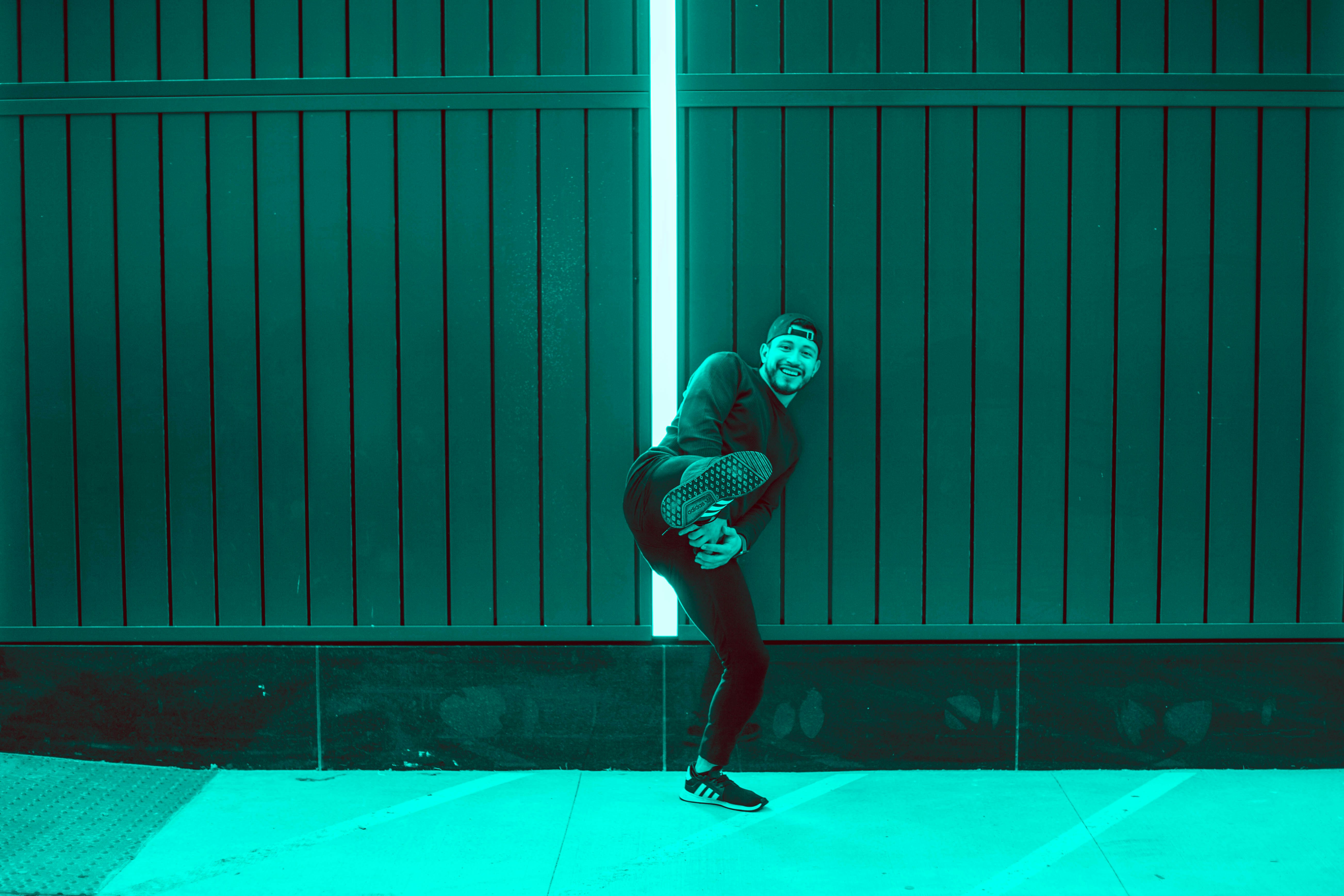 How to Modify Your Workout When You’re Feeling Low Energy – man rising his right leg