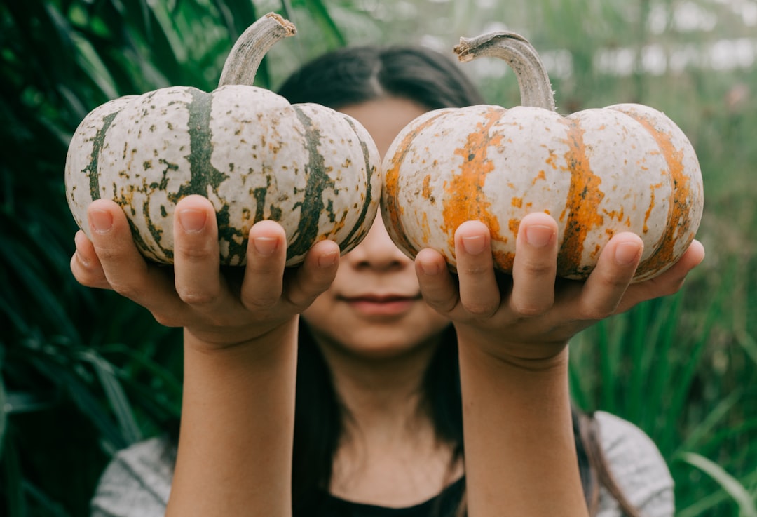 woman holding squash