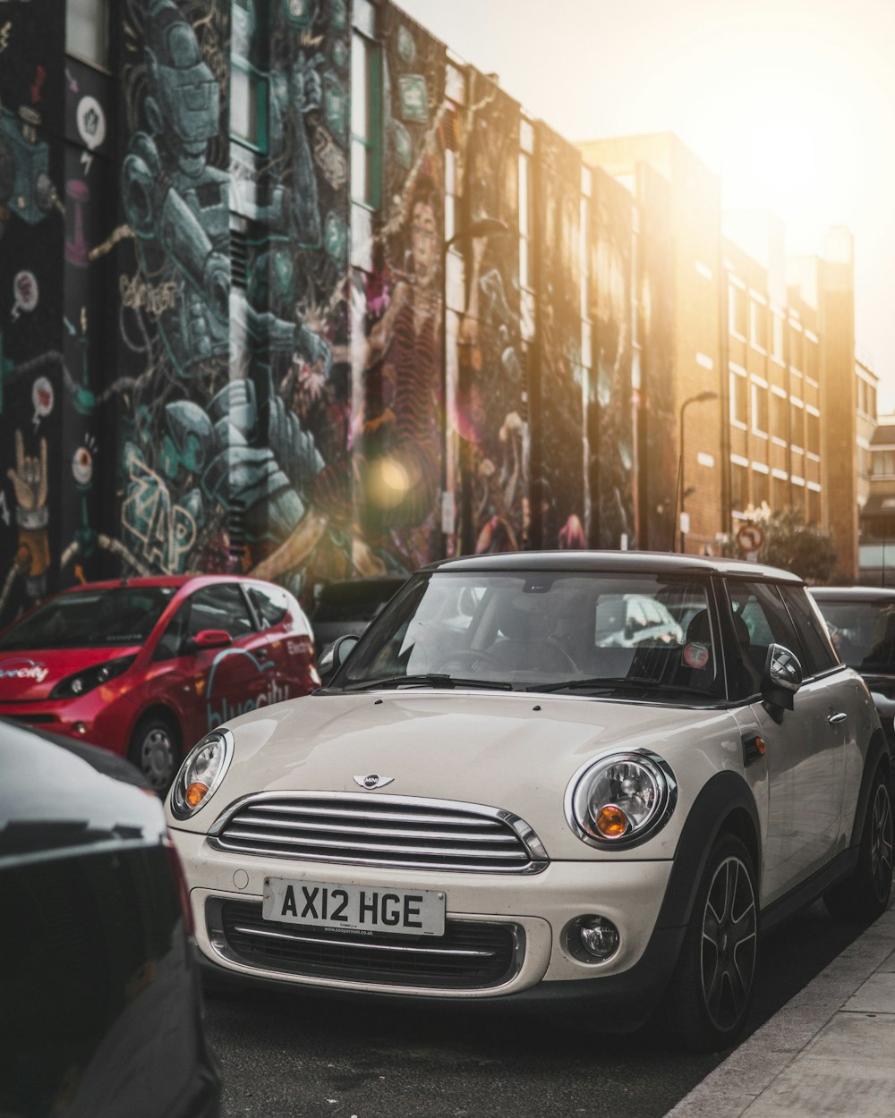 white mini Copper hatchback at road