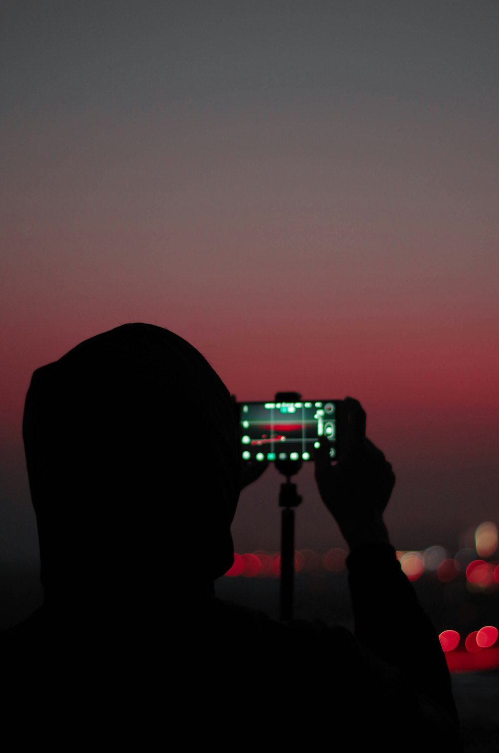 person holding Android smartphone during nighttime