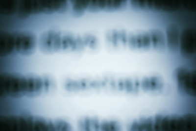 A blurred image of a job contract with misleading fine print.