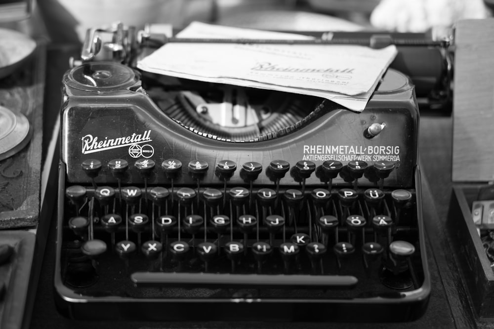 grayscale photo typewriter