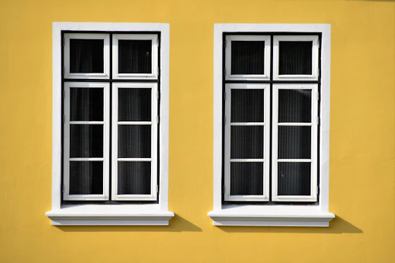 A window frame showing water damage
