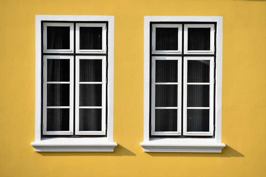 A technician servicing a window