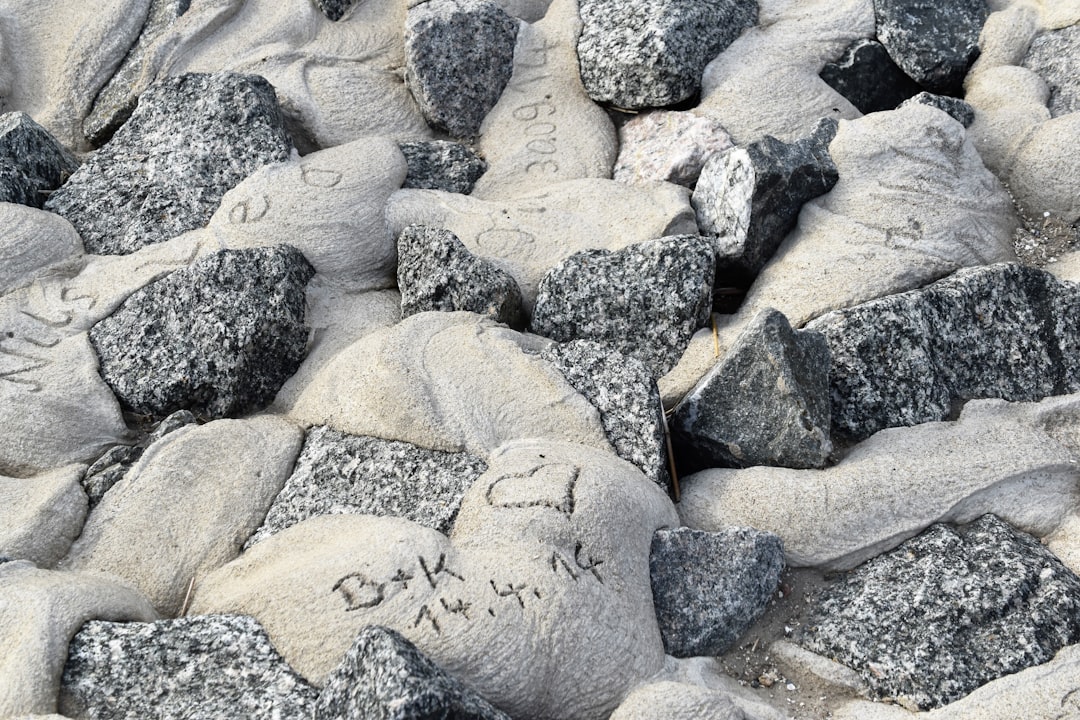 gray rocks at daytime, Love words forever in the stones of Büsums coastline