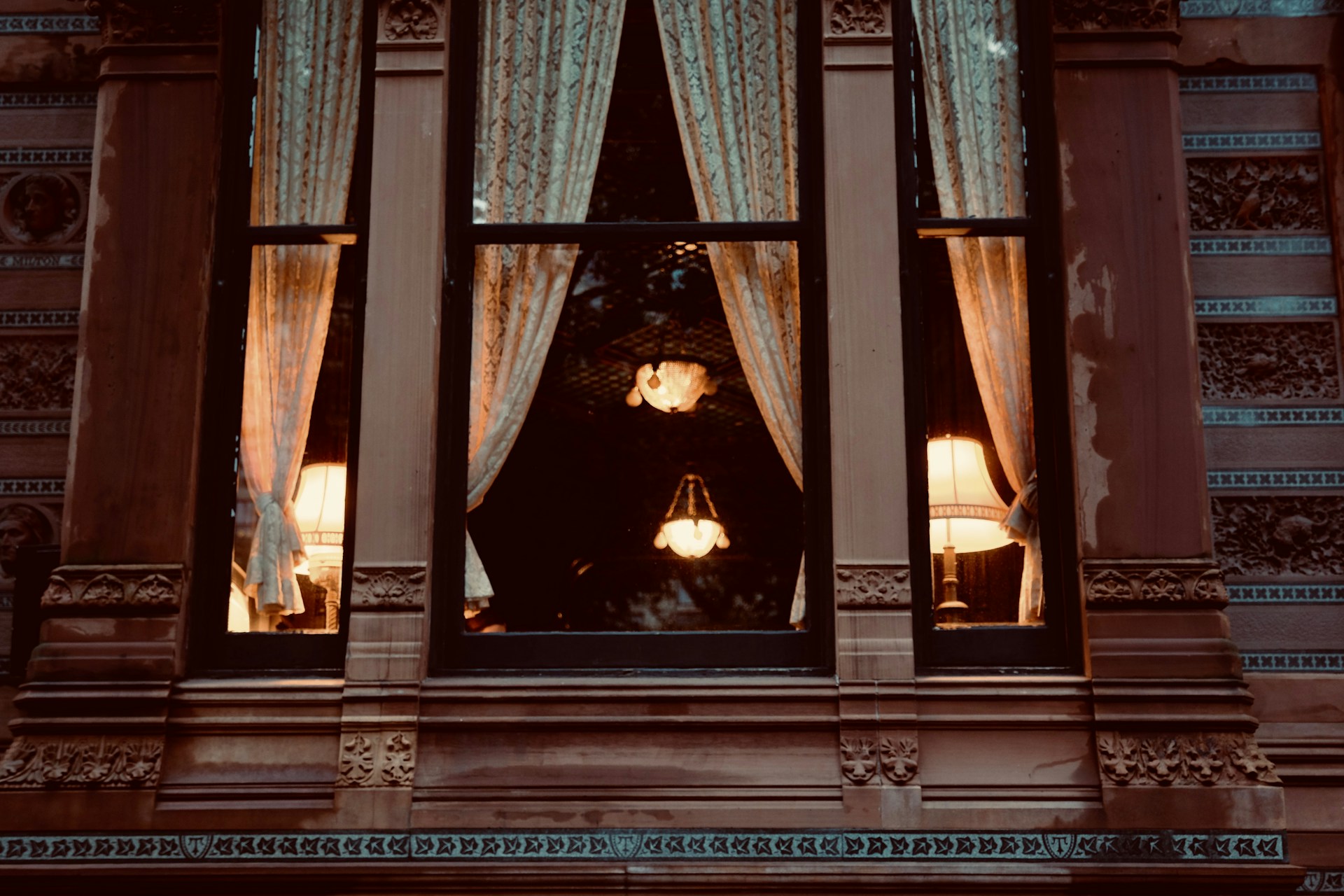 An inviting view of a cozy interior featuring exquisite curtains and tapestries.