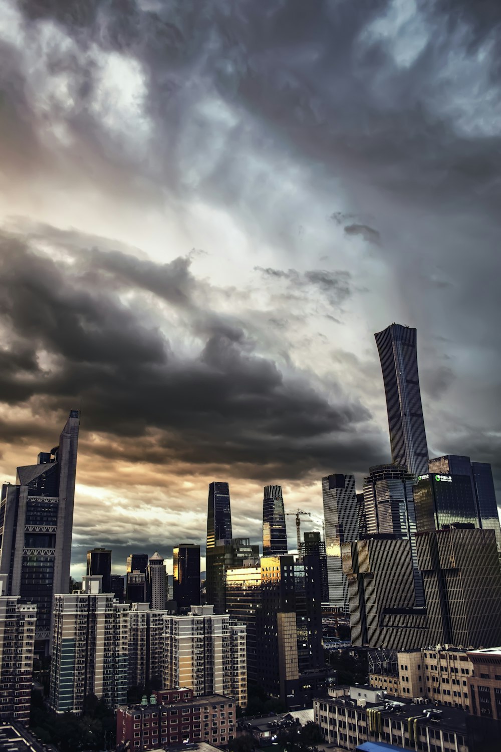 high-rise building under gray sky