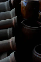 A cozy corner of the gallery with a mix of modern and traditional ceramic pots.