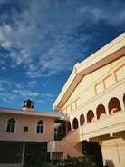A close-up of a mosque listing management interface with smooth shadows and rounded cards.