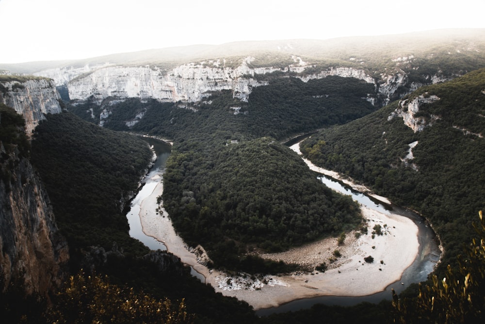 high-angle photography of mountain covered with trees