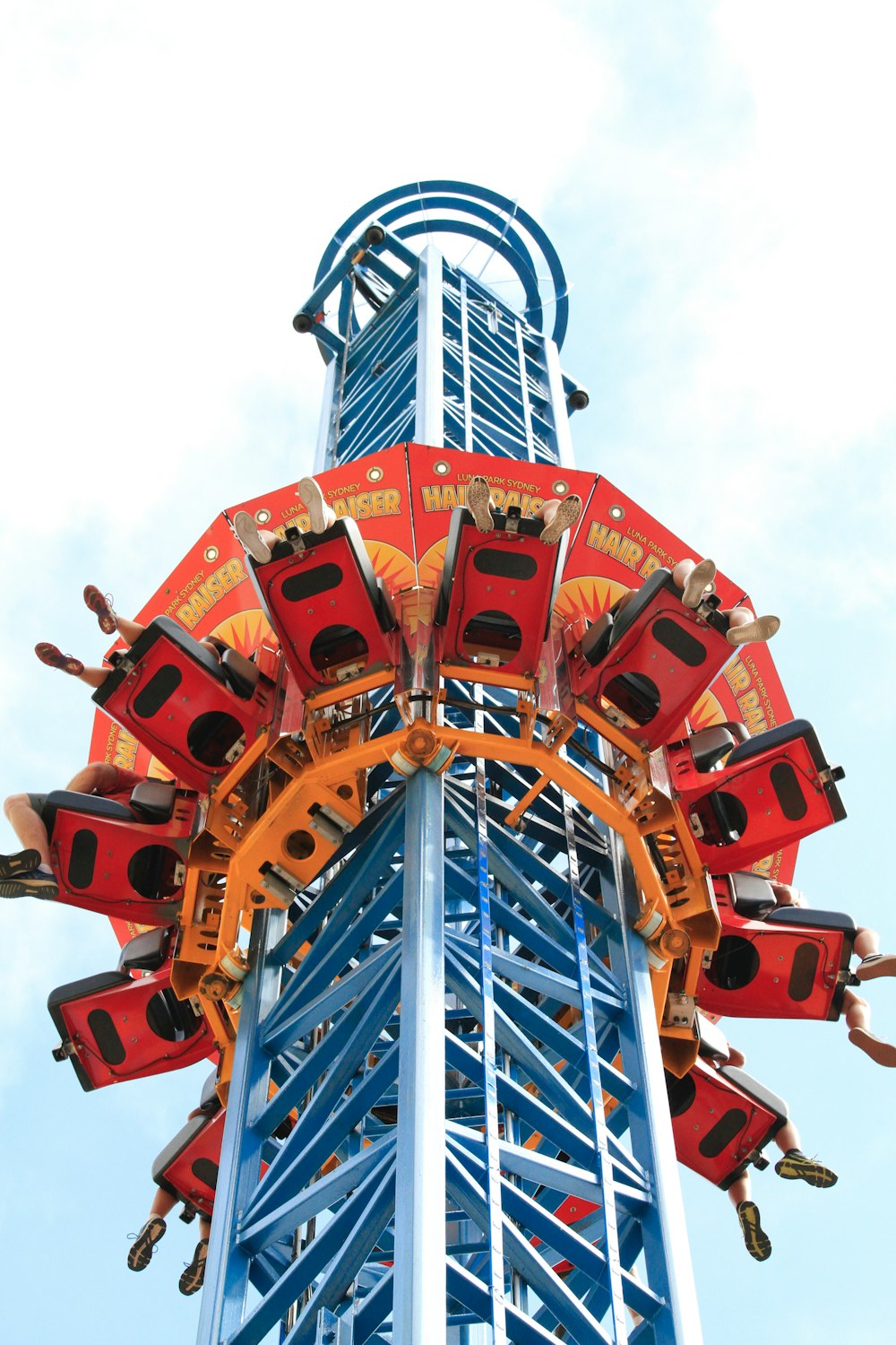 blue and orange tower amusement ride