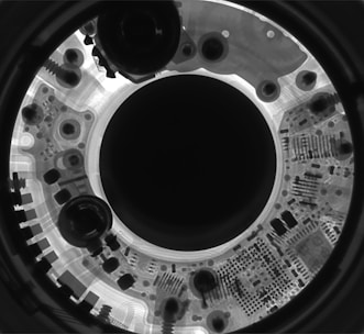 a black and white photo of a circular object