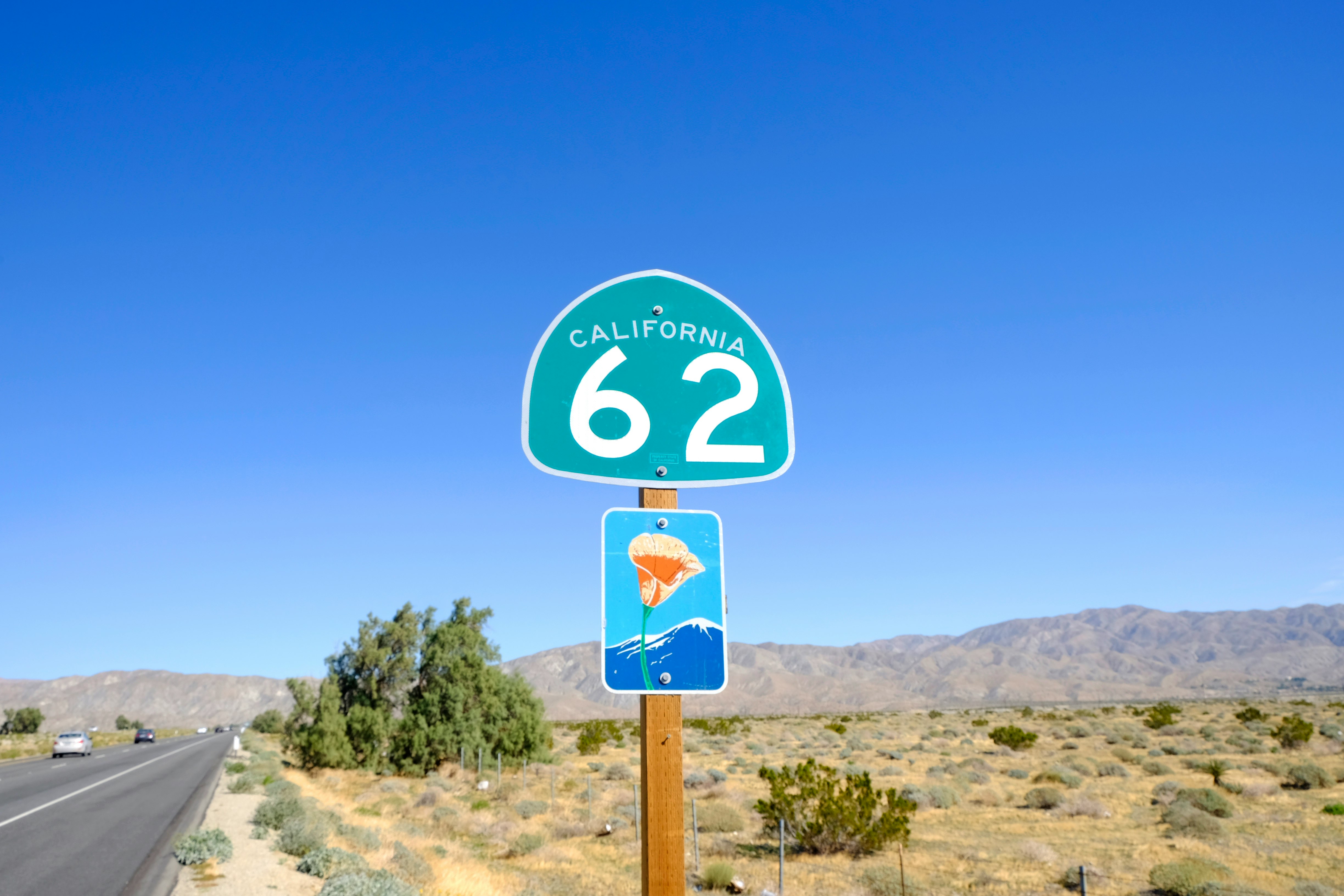 California 62 signage beside roadway