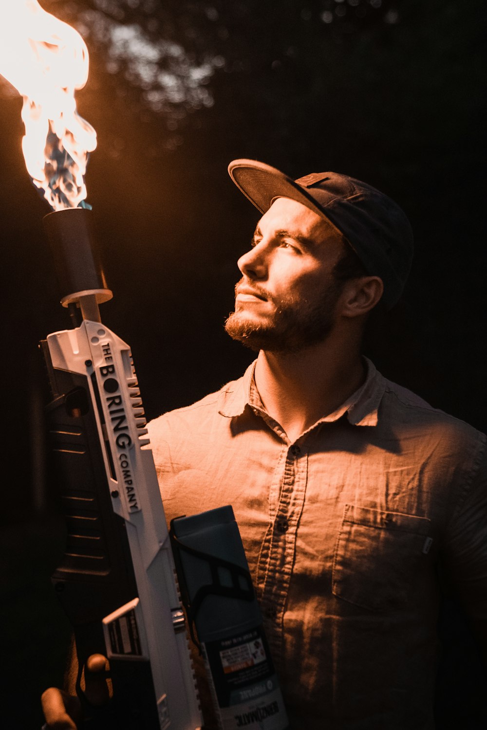 man holding flamethrower