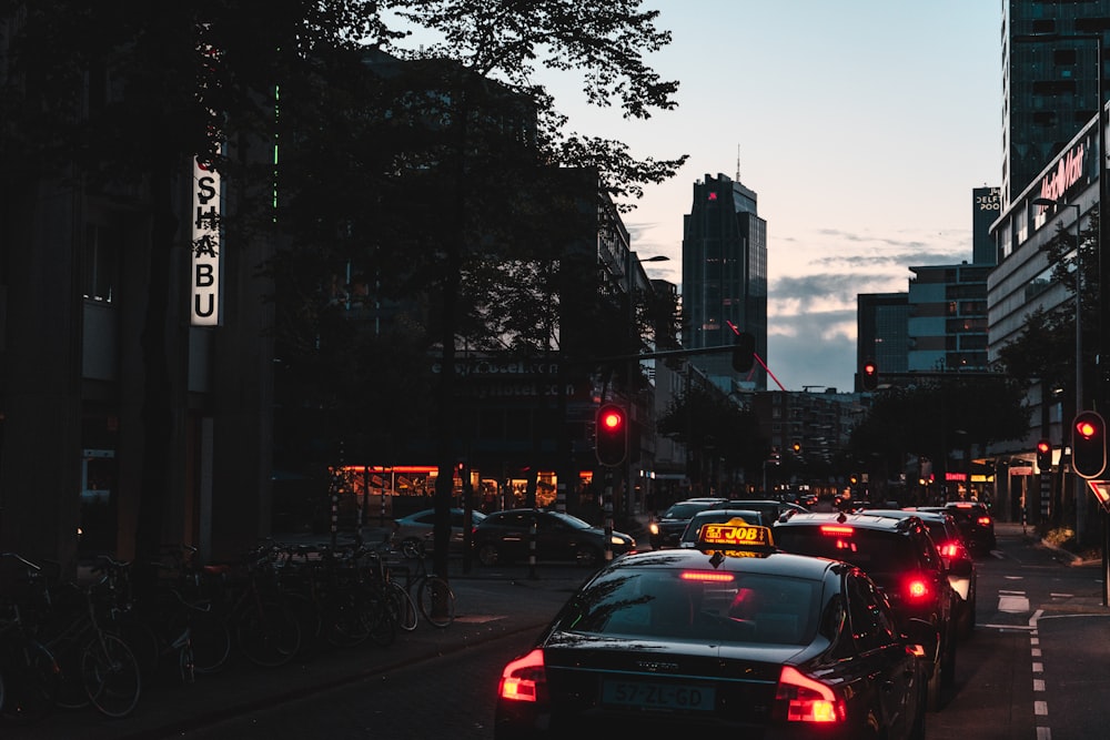 group of cars running on streets