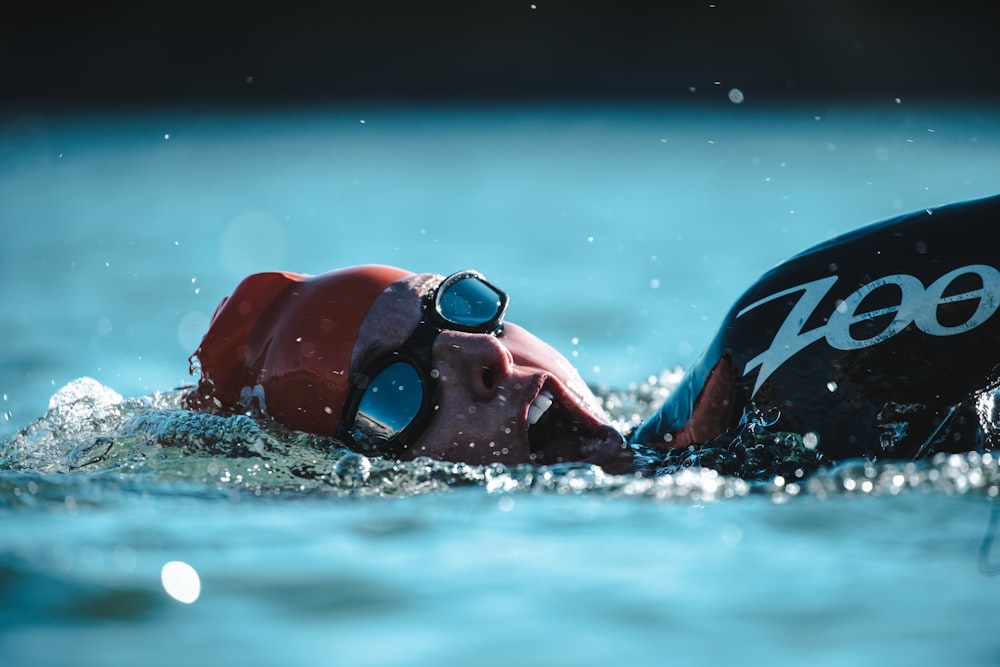 person swimming during daytime