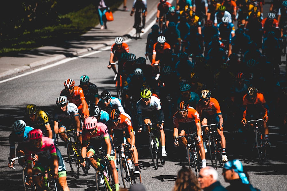 group of people riding on bicycles