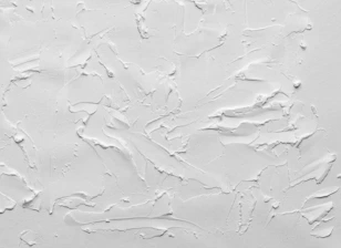a white painted wall with white paint on it