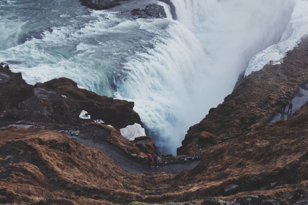 aerial photography of flowing waterfall