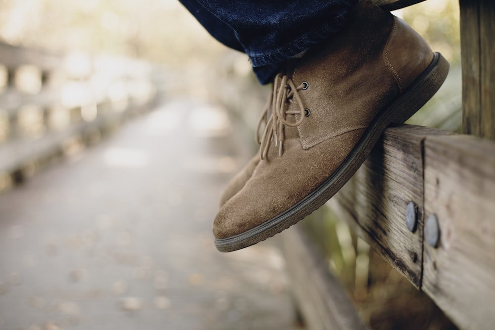 person wearing brown boots