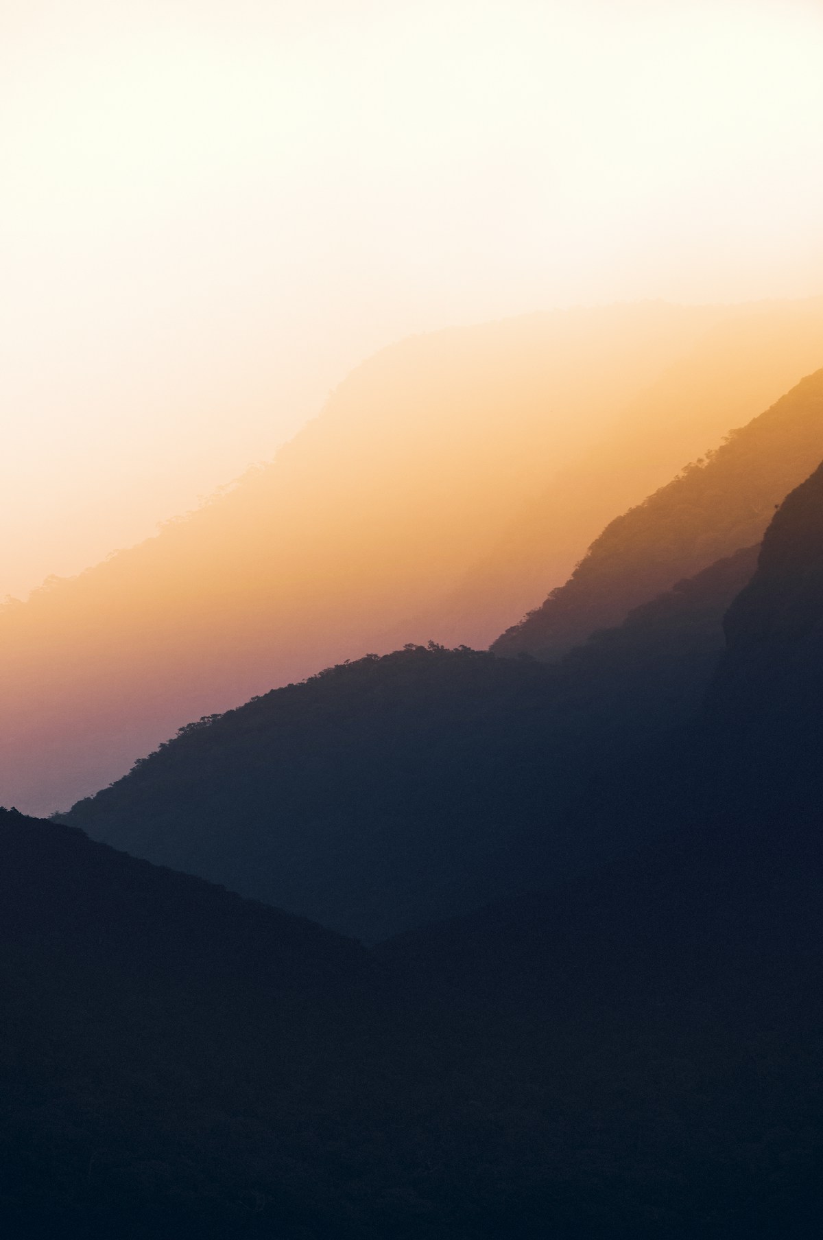 Sunrise from the summit of Adam's Peak (Sri Pada), Sri Lanka, with a sea of clouds below