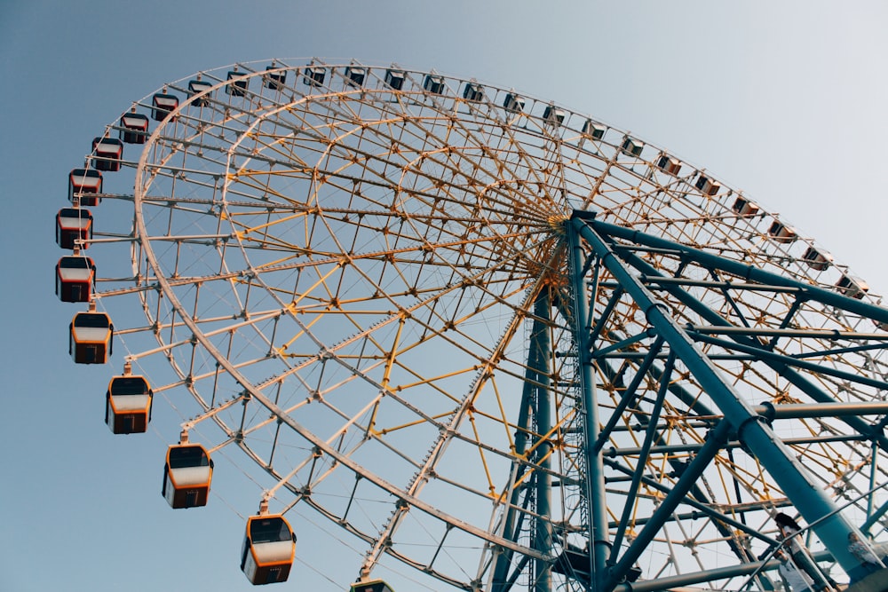 white and blue ferris wheel