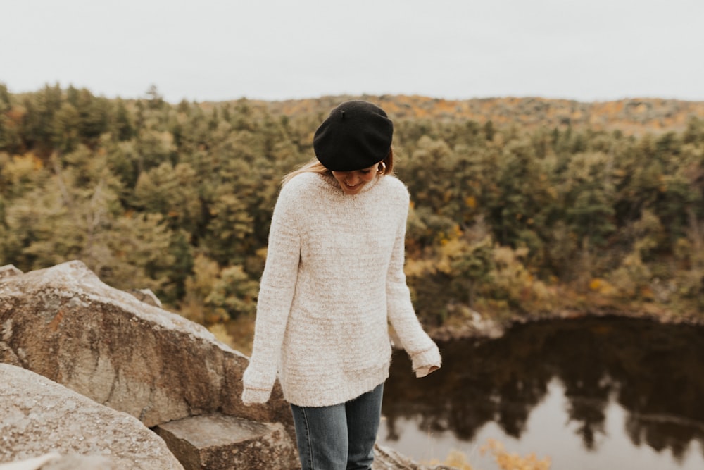 woman standing near cliff