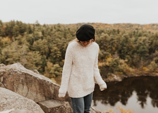 woman standing near cliff