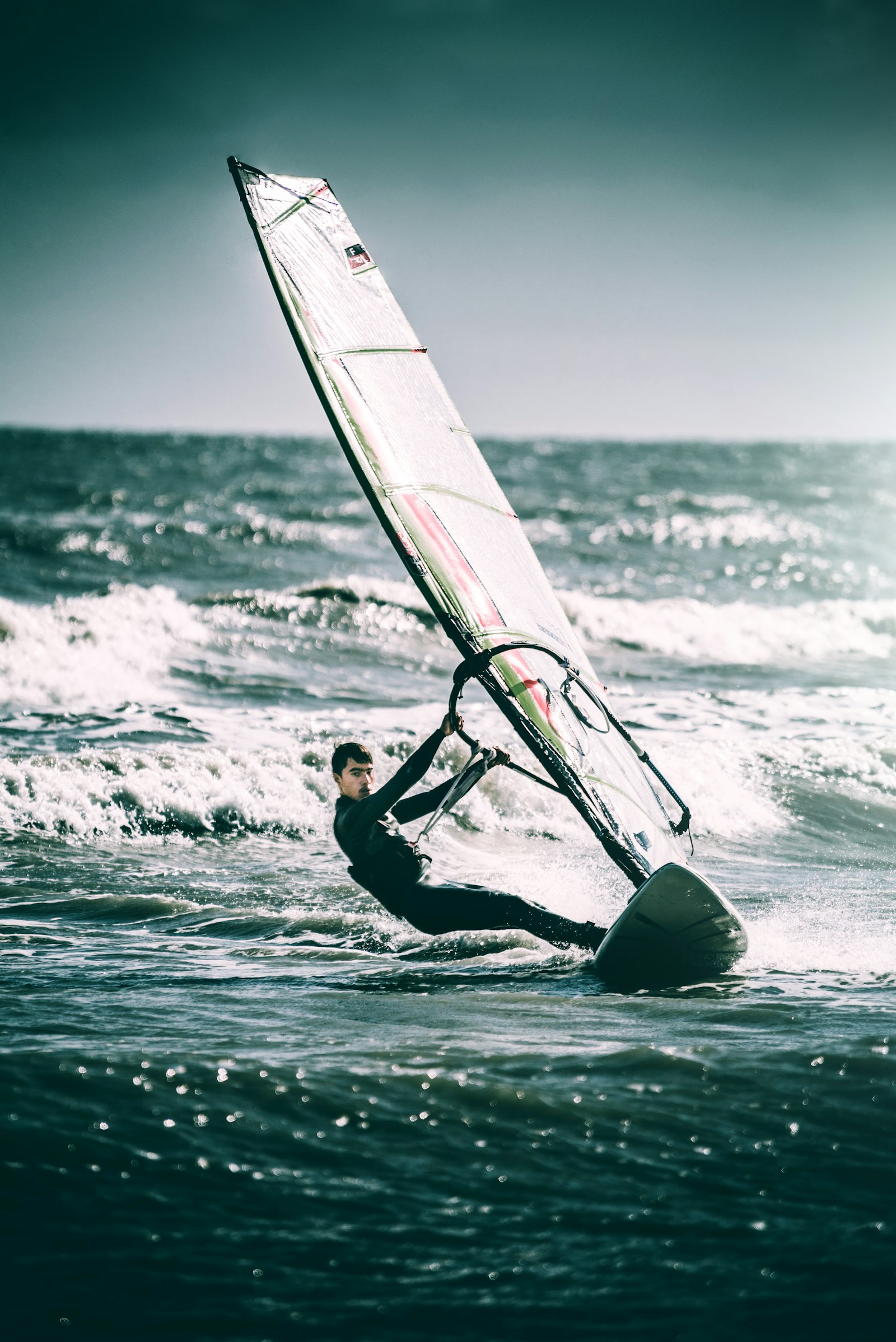 Nikon AF Nikkor 80-400mm F4.5-5.6D ED VR sample photo. Man sailing on sea photography