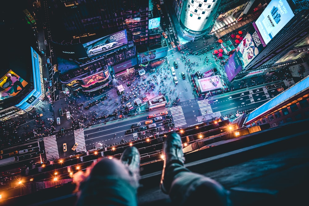 man sitting on building