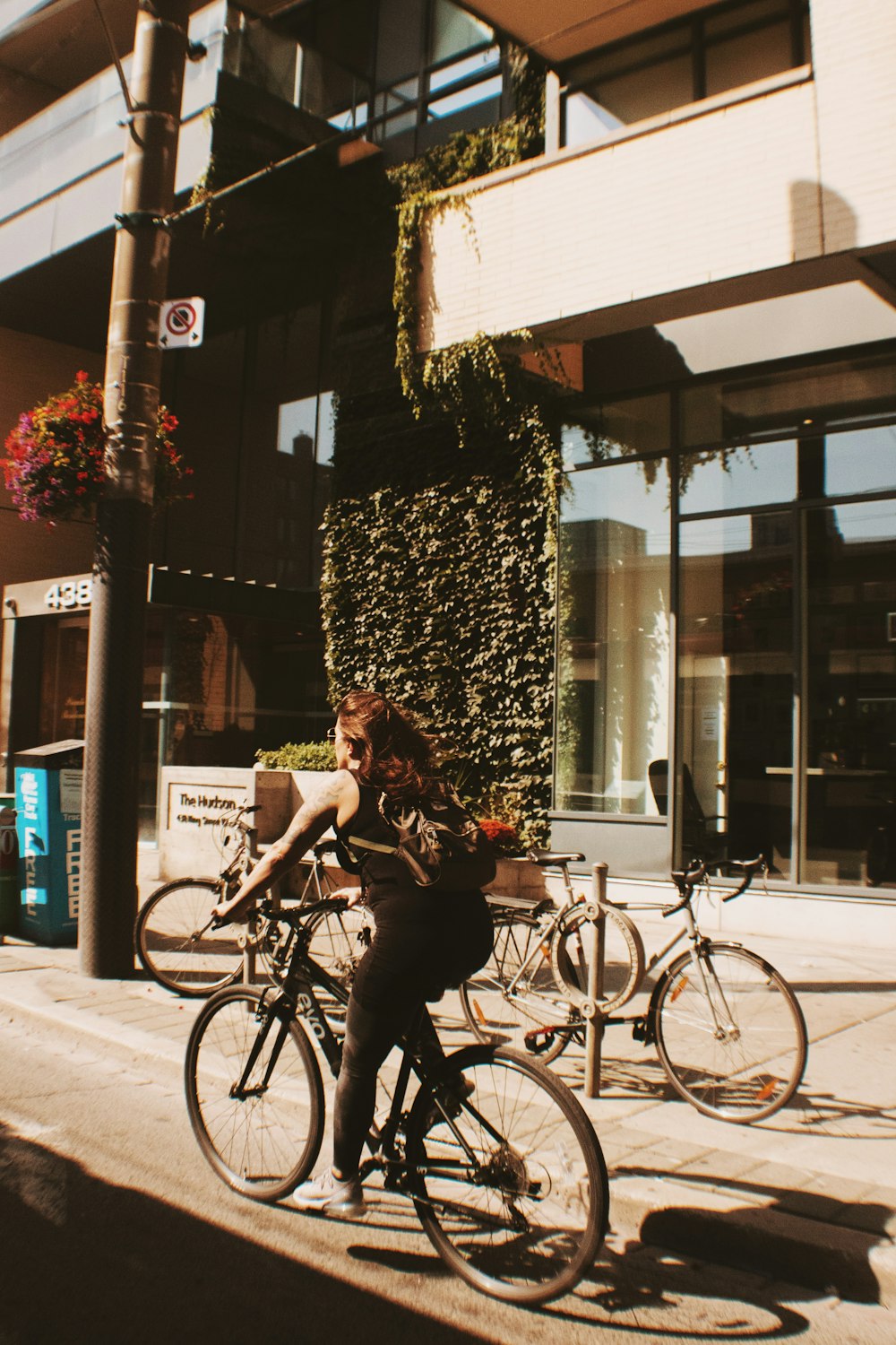 woman riding on bicycle during daytime