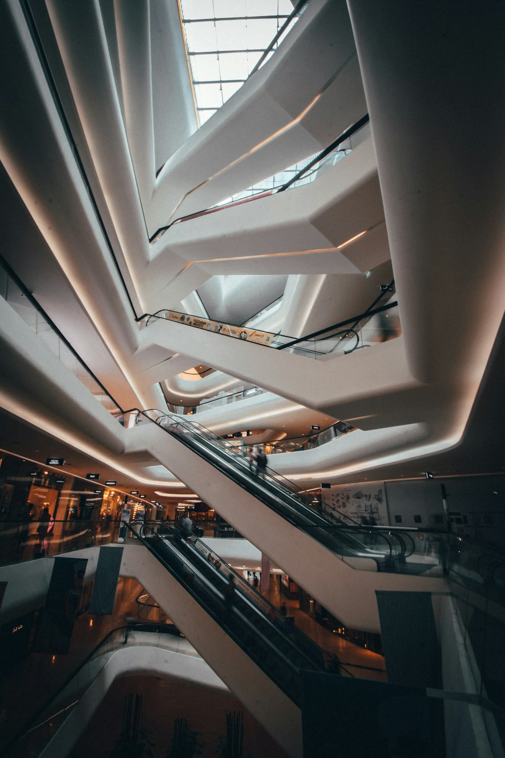interior photo of a mall's escalators