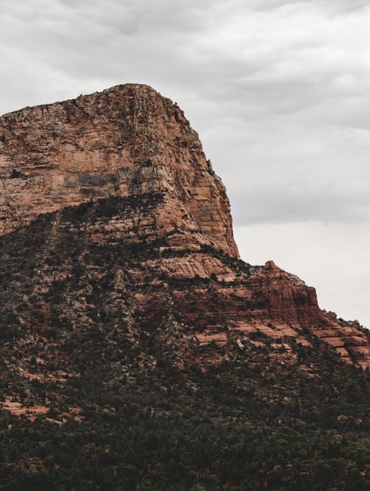 brown stone hill under white cloudy sky in Sedona United States
