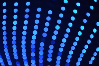 a close up of blue lights in the dark