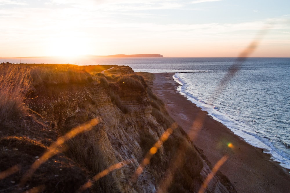 body of water beside shore