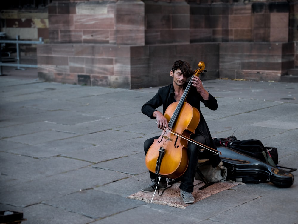 man playing cello