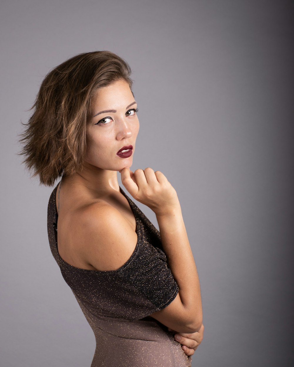 woman in black and gray top