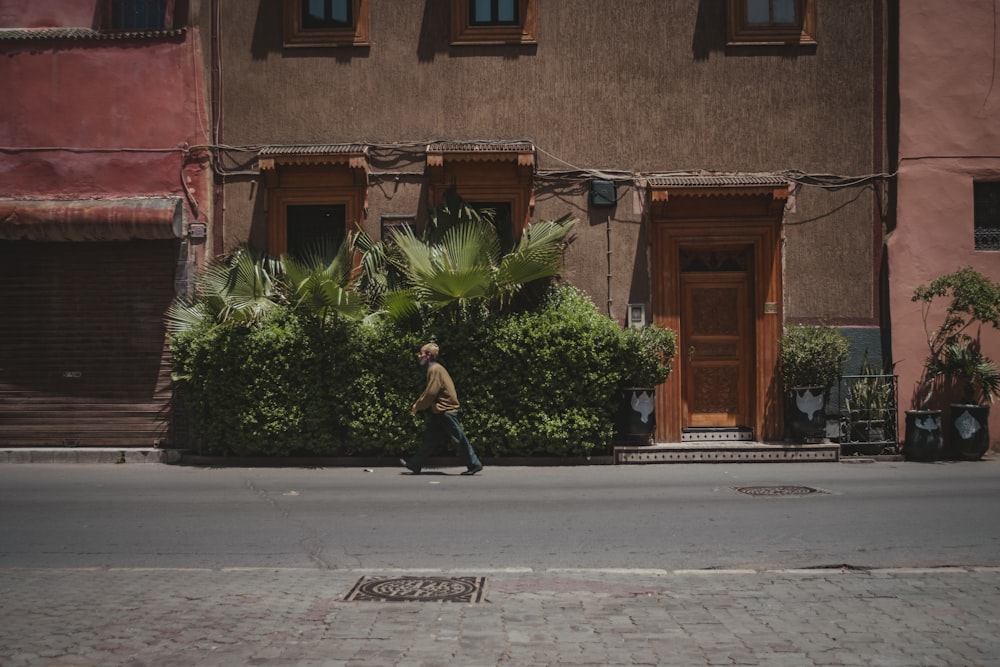 man walking on street