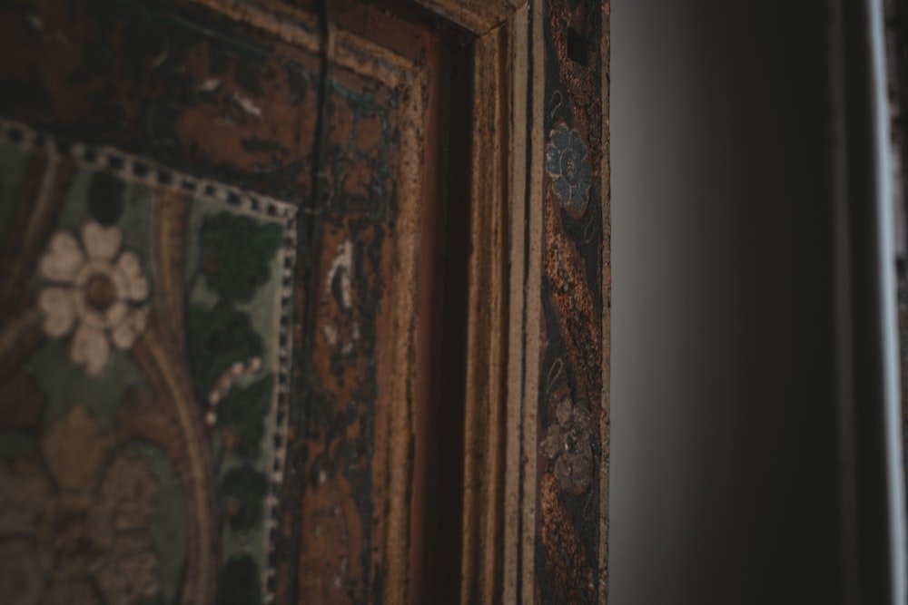 close-up photo of brown and blue floral frame