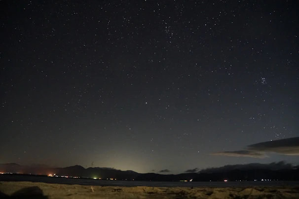 A clear night sky filled with stars above the quiet Catskill Haven retreat.