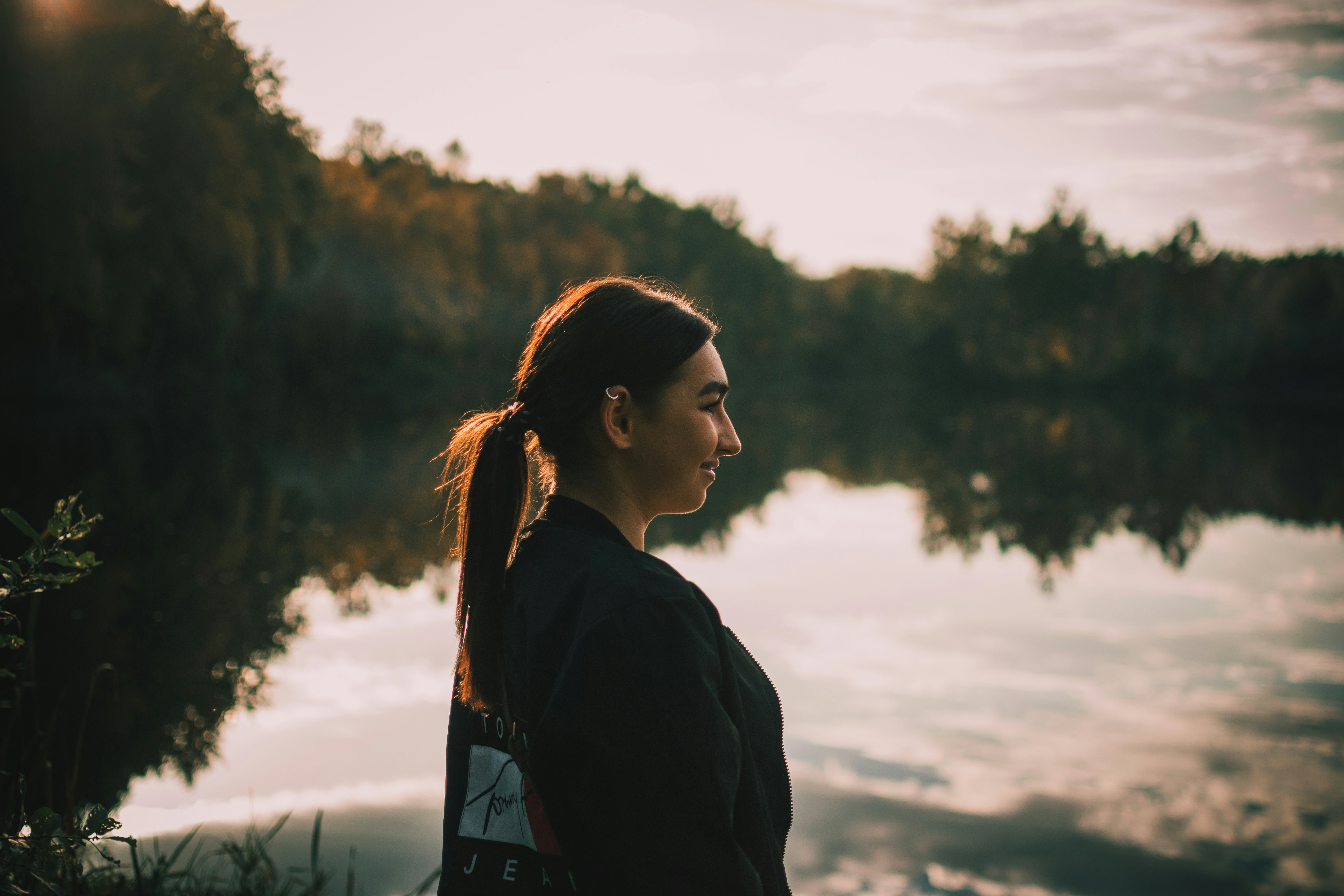 woman near body of water