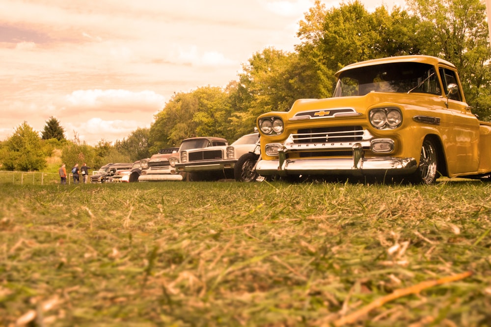 assorted-color vehicles parked outdoor during daytime