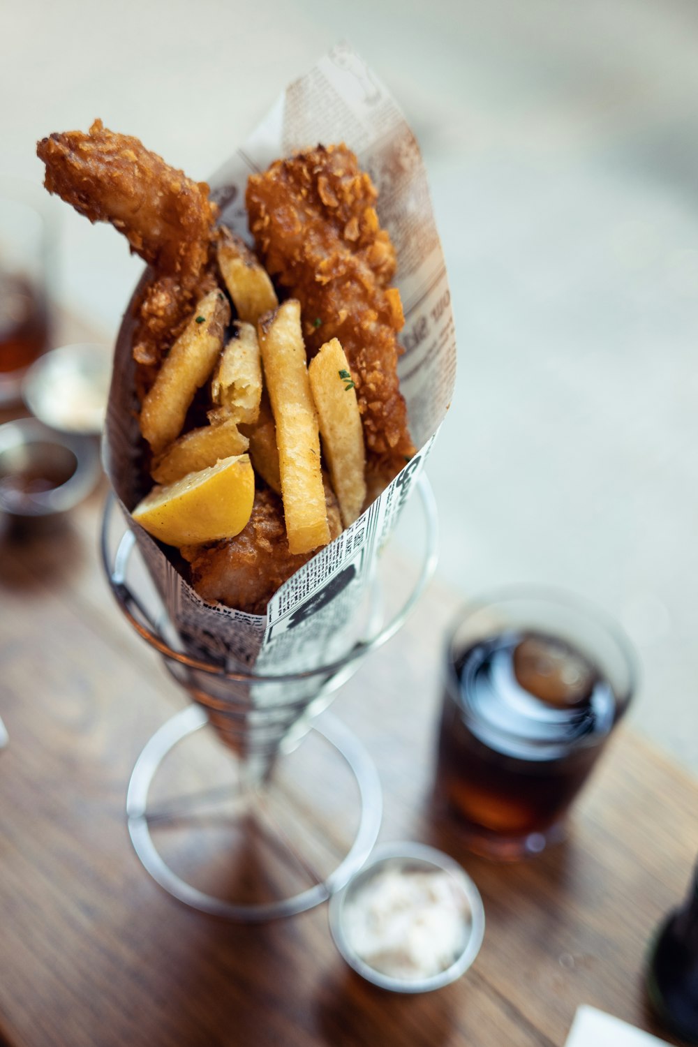 food in glass beside mug