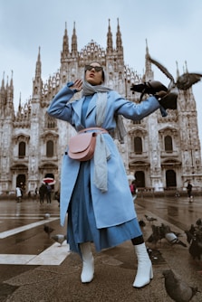 woman near pigeons