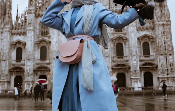 woman near pigeons