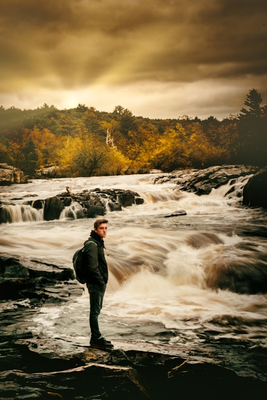 man standing beside river in Altoona United States