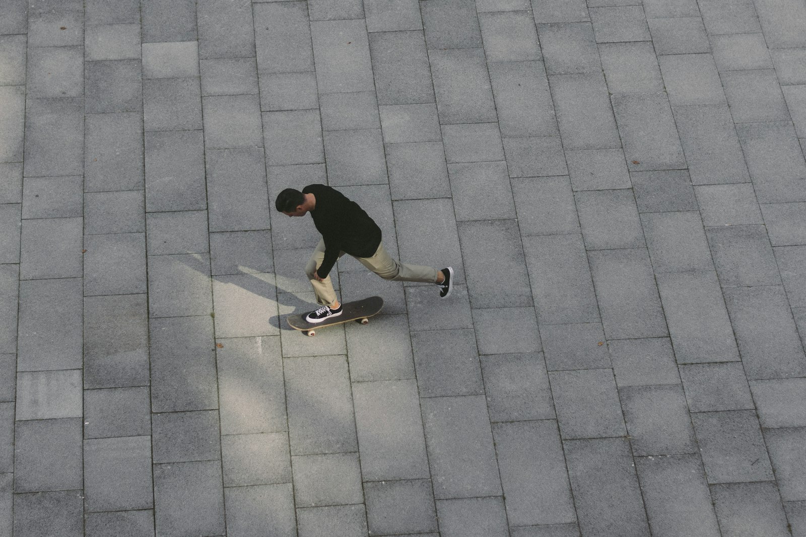 Nikon D7100 + Nikon AF-S Nikkor 50mm F1.8G sample photo. Man skateboarding on concrete photography