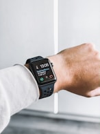 space black stainless steel Apple Watch at 13:05
